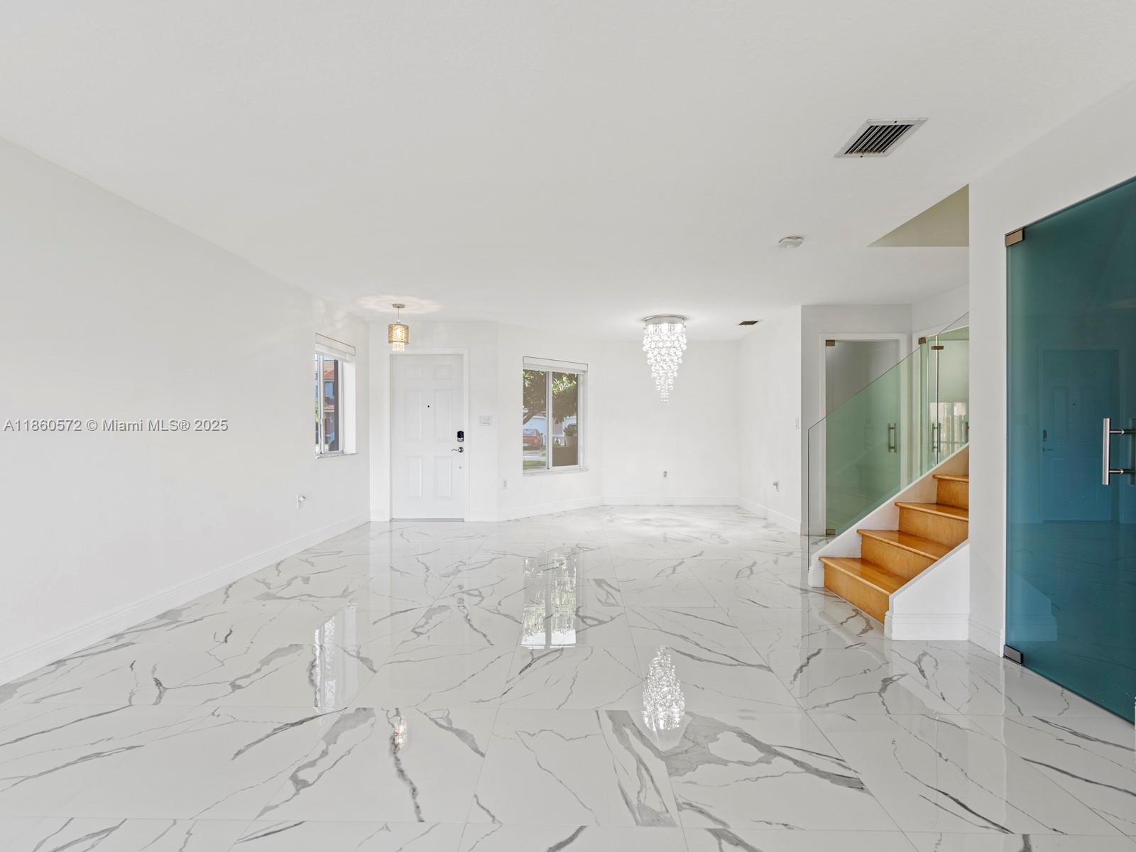 16544 Southwest 68th Terrace Miami, FL 33193 - Photo 10 of 32 a view of an empty room