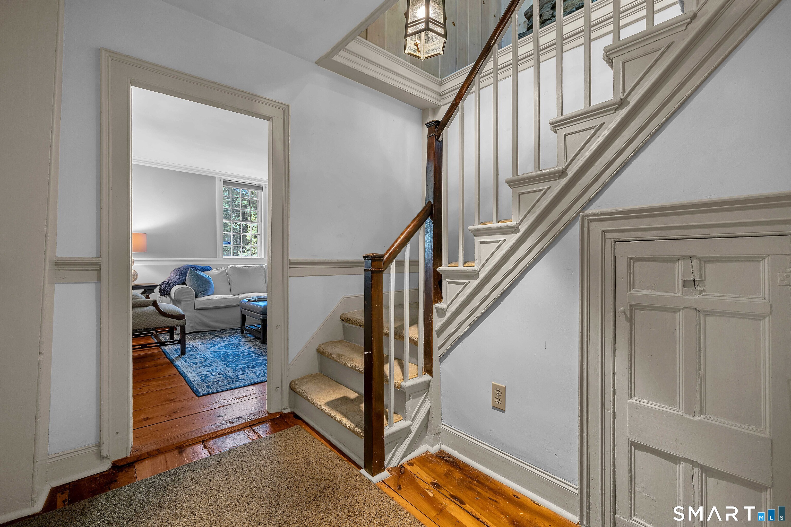 448 Grove Beach Road North Westbrook, CT 06498 - Photo 25 of 38 a view of front door with hallway and wooden floor