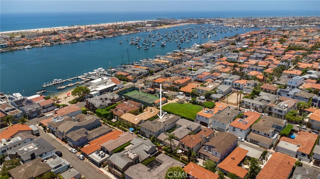 120 Via Trieste Newport Beach, CA 92663 - Photo 20 of 39 an aerial view of a house with a lake