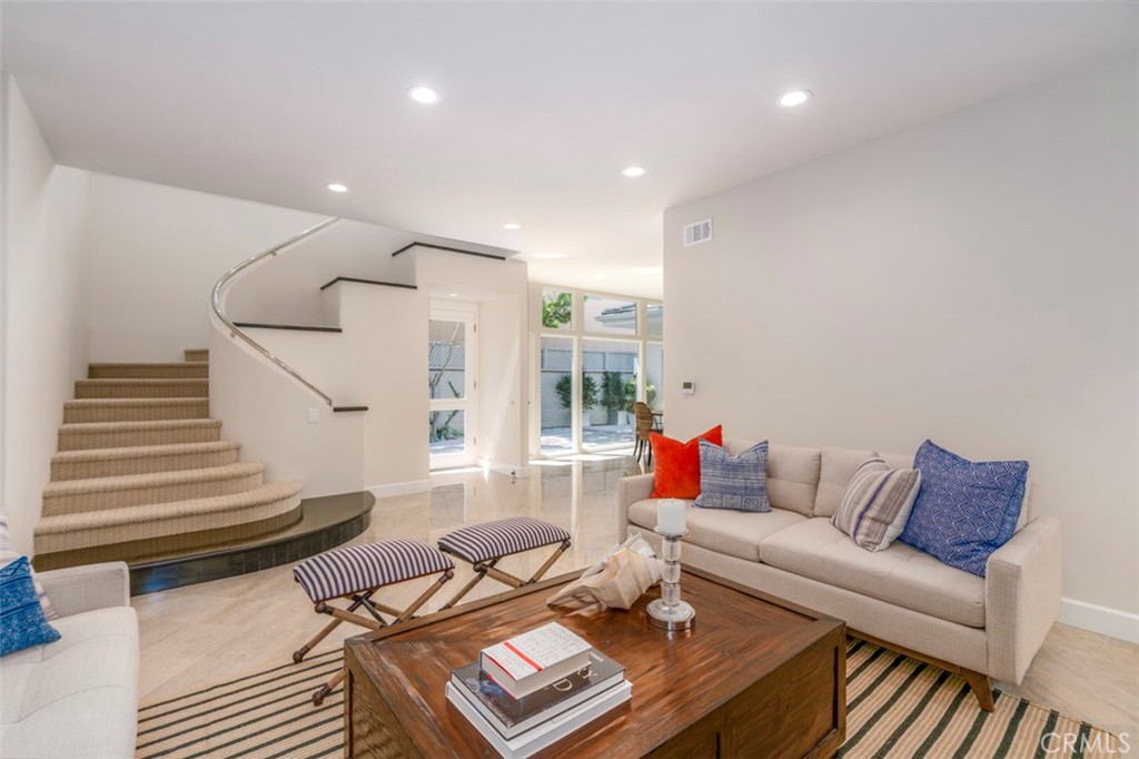 120 Via Trieste Newport Beach, CA 92663 - Photo 6 of 39 a living room with furniture and wooden floor
