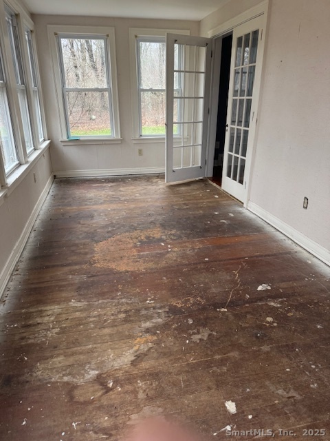78 Hennequin Road Columbia, CT 06237 - Photo 13 of 27 an empty room with windows