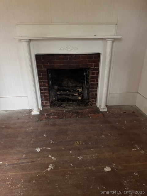 78 Hennequin Road Columbia, CT 06237 - Photo 16 of 27 a living room with a fireplace