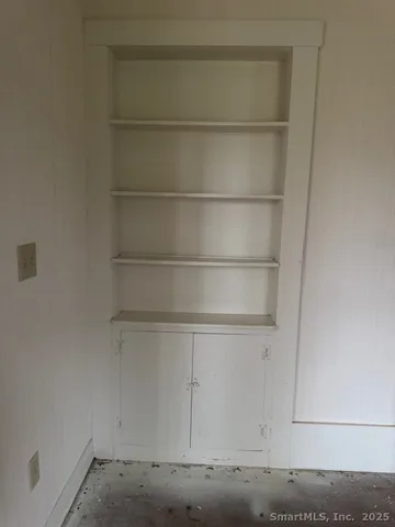 a room with hard wood floors and a sink