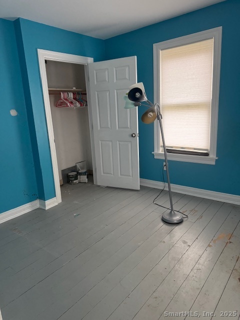 78 Hennequin Road Columbia, CT 06237 - Photo 21 of 27 a living room with a furniture and a window