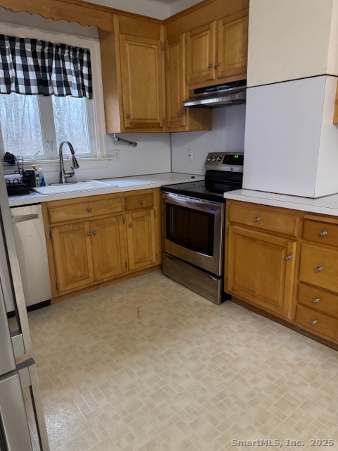 78 Hennequin Road Columbia, CT 06237 - Photo 7 of 27 a kitchen with granite countertop a sink and cabinets