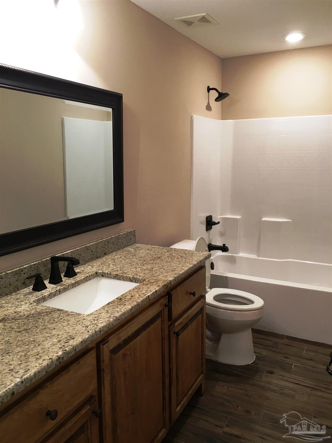 5406 South A Jones Road Milton, FL 32583 - Photo 20 of 35 Here's a view of the 3rd bathroom.
