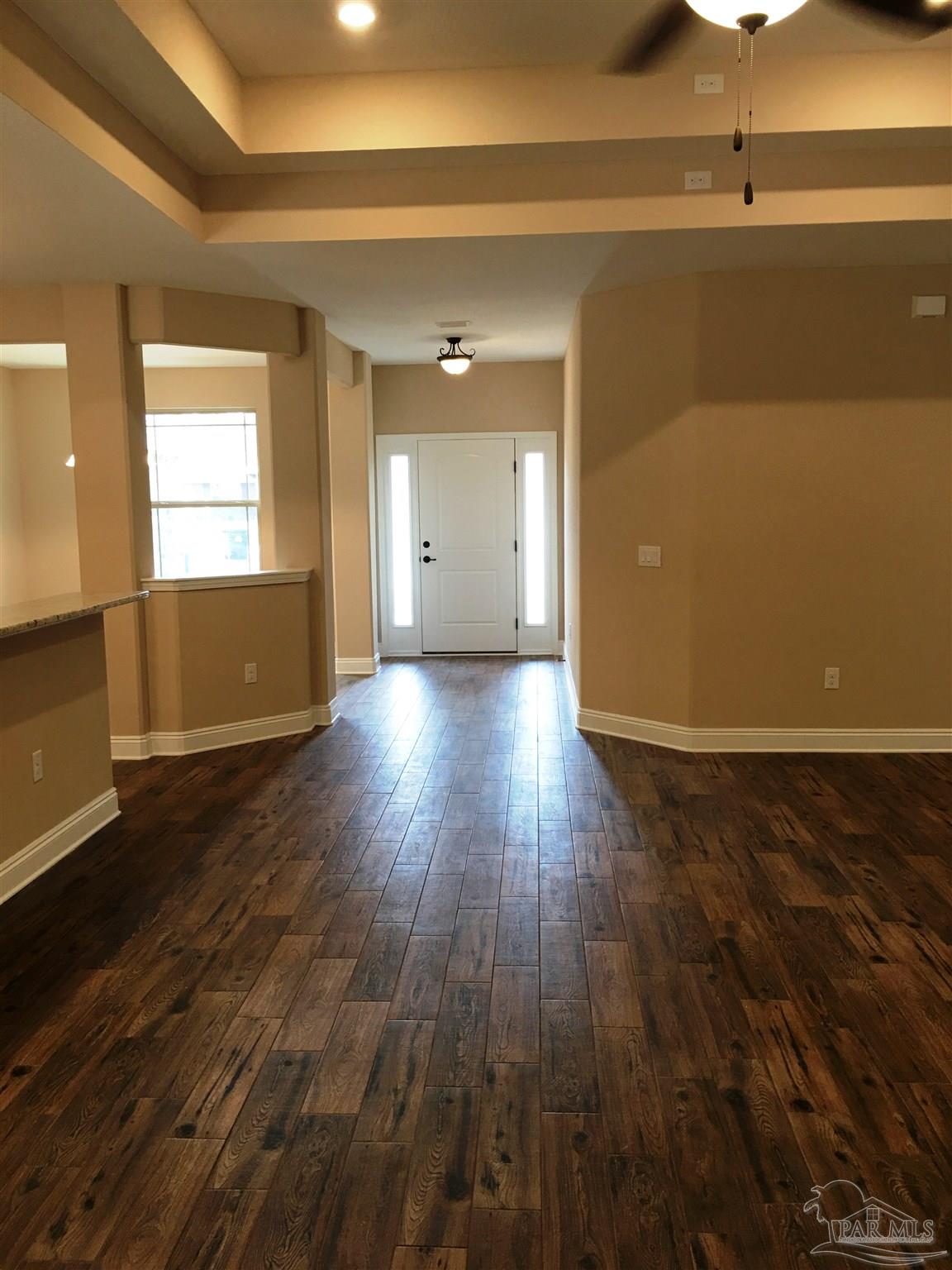 5406 South A Jones Road Milton, FL 32583 - Photo 24 of 35 Here's a view from living room to foyer.