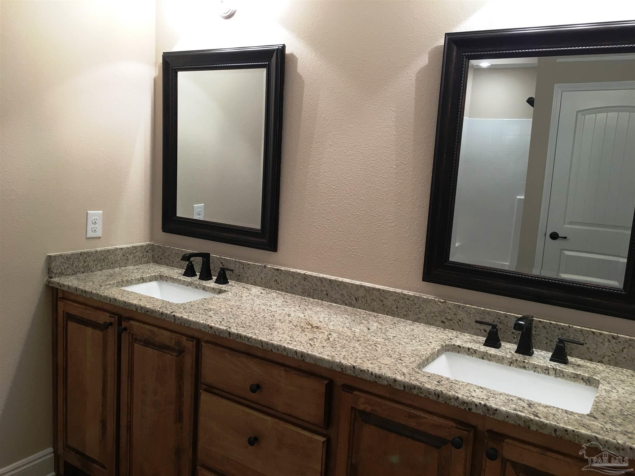 5406 South A Jones Road Milton, FL 32583 - Photo 27 of 35 Master bath features a dual sink vanity top.