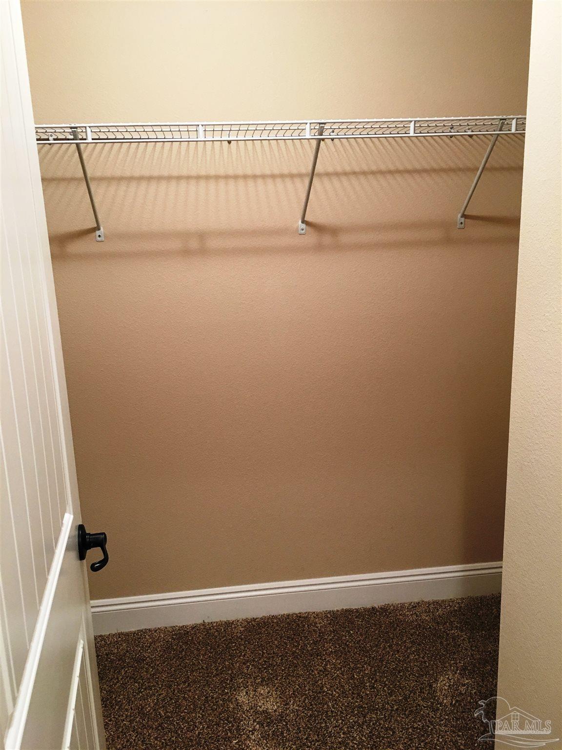 5406 South A Jones Road Milton, FL 32583 - Photo 28 of 35 Here's a view of master bath walk-in closet #1.