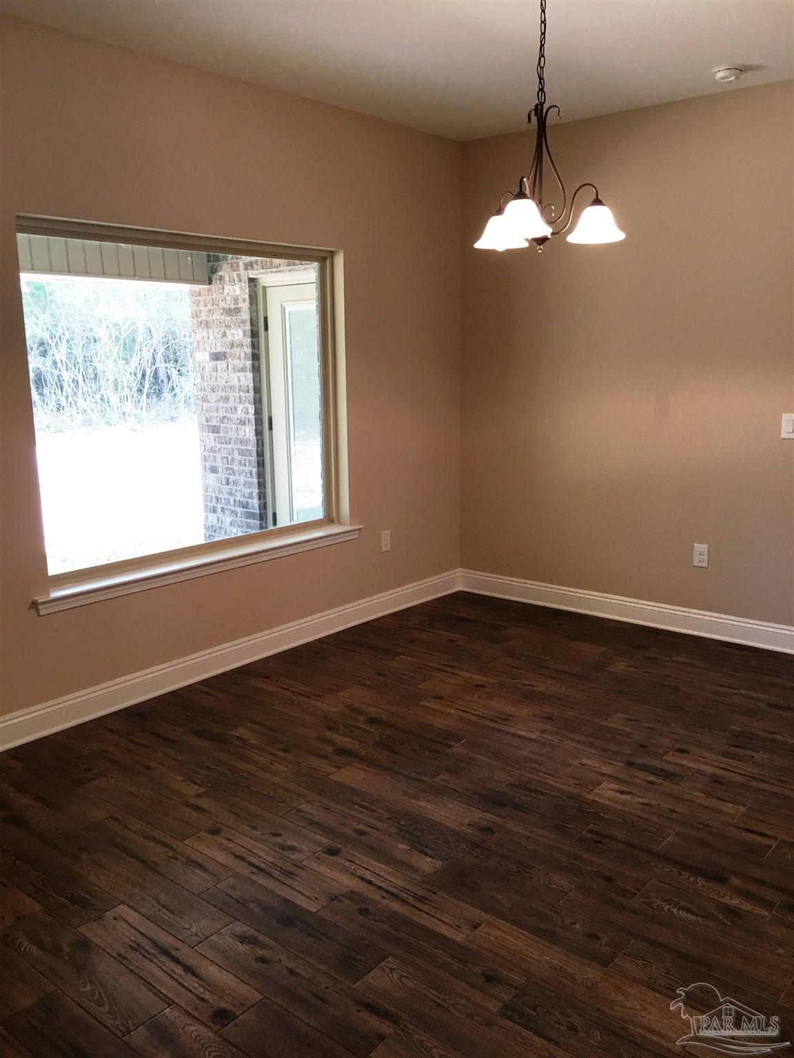5406 South A Jones Road Milton, FL 32583 - Photo 10 of 35 Partake of casual meals in the breakfast nook.