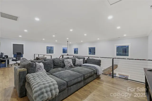 a living room with furniture and a couch