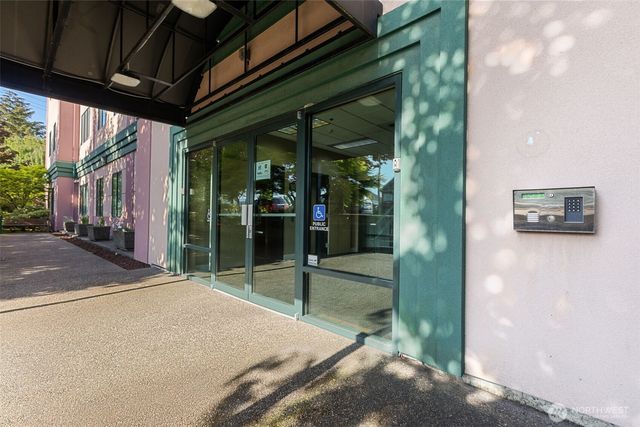 a bathroom with a tub and shower