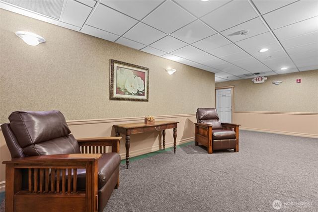 a view of a livingroom with furniture