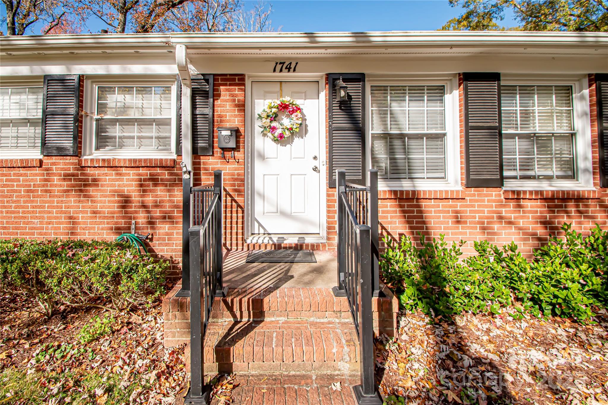 1741 Dallas Avenue Charlotte, NC 28205 - Photo 14 of 40 a view of a house with a balcony