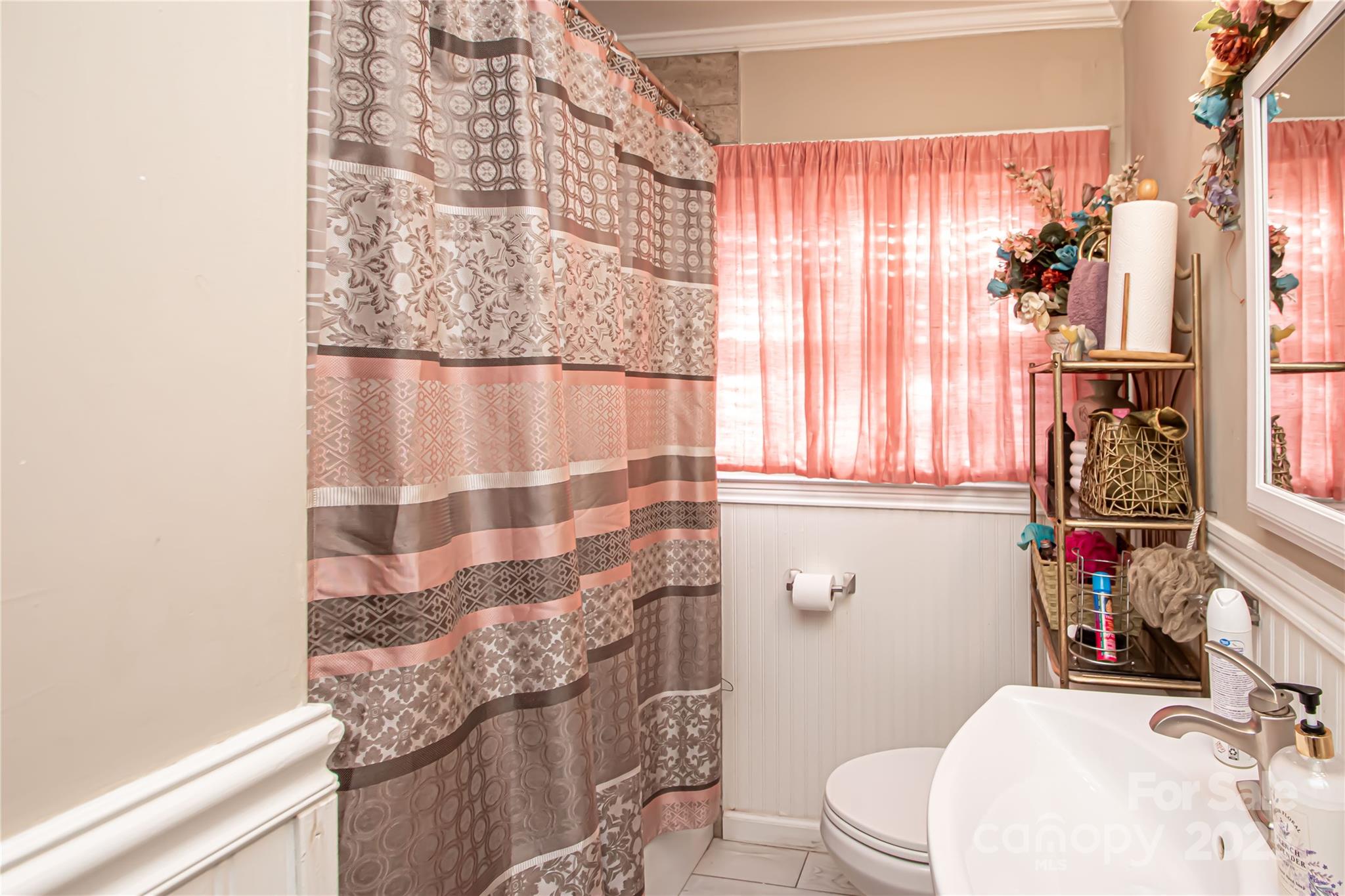 1741 Dallas Avenue Charlotte, NC 28205 - Photo 28 of 40 a bathroom with a sink toilet and shower