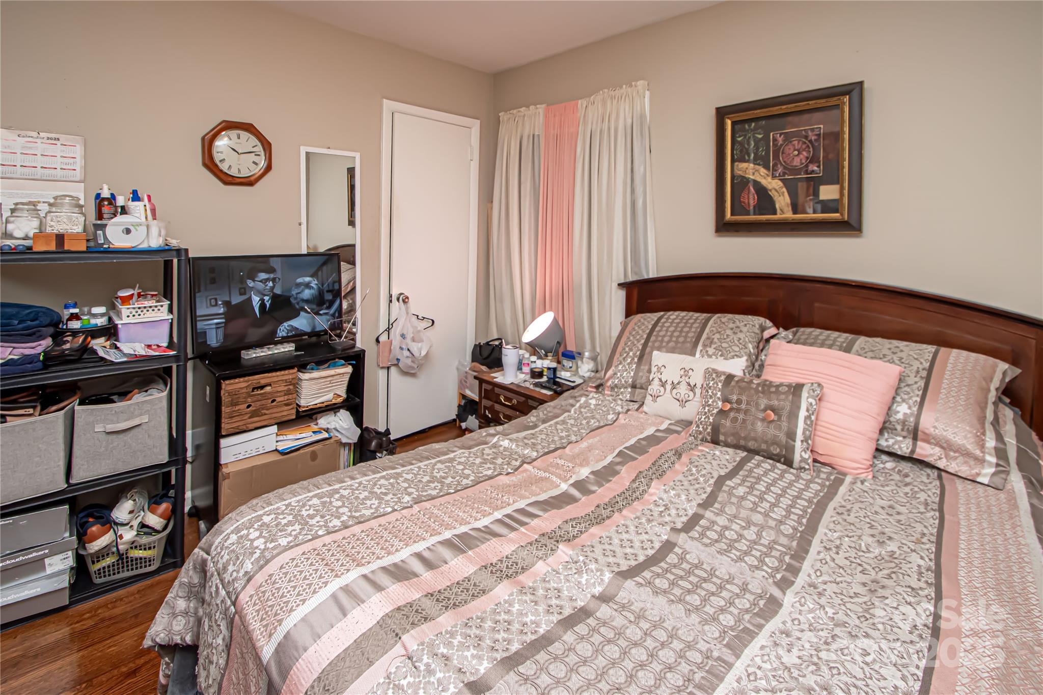 1741 Dallas Avenue Charlotte, NC 28205 - Photo 35 of 40 a bedroom with a bed and a lamp on dresser