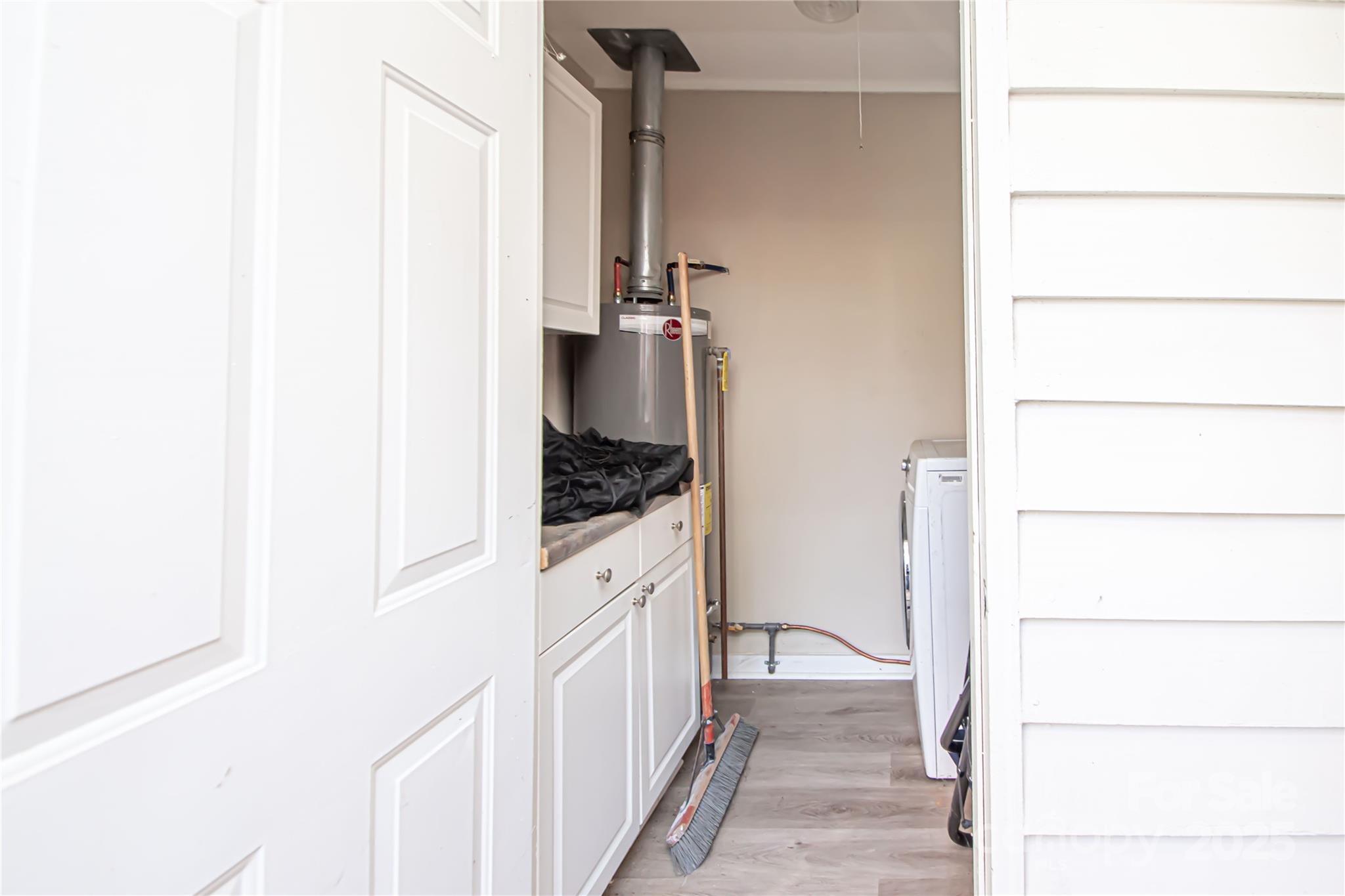 1741 Dallas Avenue Charlotte, NC 28205 - Photo 40 of 40 a kitchen with a refrigerator and a stove