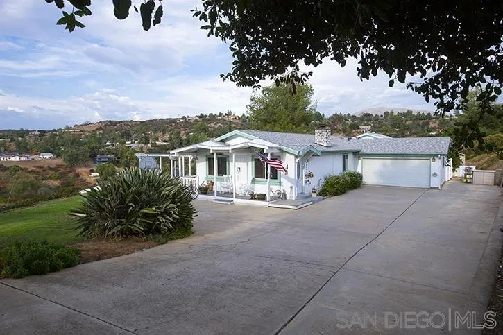 854 South Grade Road Alpine, CA 91901 - Photo 1 of 15 a front view of a house with garden