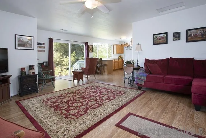 854 South Grade Road Alpine, CA 91901 - Photo 11 of 15 a living room with furniture and a rug