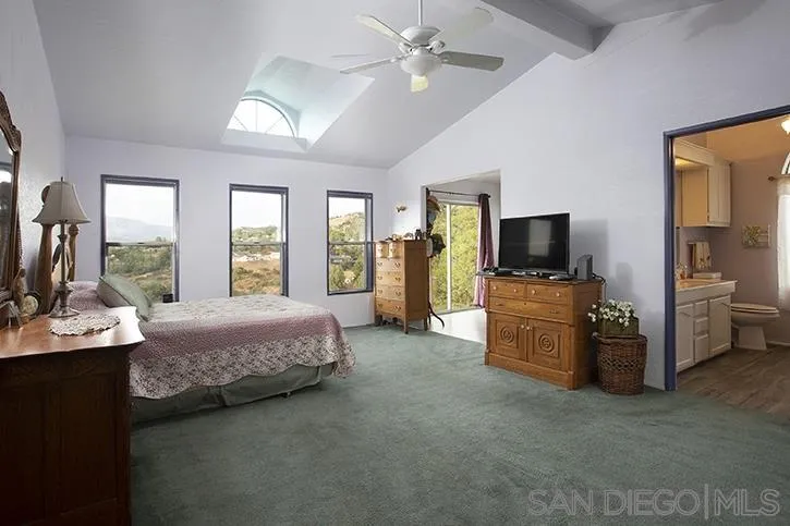 854 South Grade Road Alpine, CA 91901 - Photo 7 of 15 a living room with furniture and flat screen tv