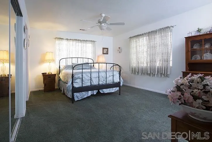 854 South Grade Road Alpine, CA 91901 - Photo 10 of 15 a bed sitting in a room next to a window