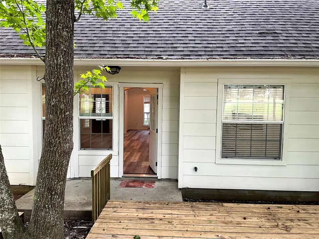 a front view of a house with a garage