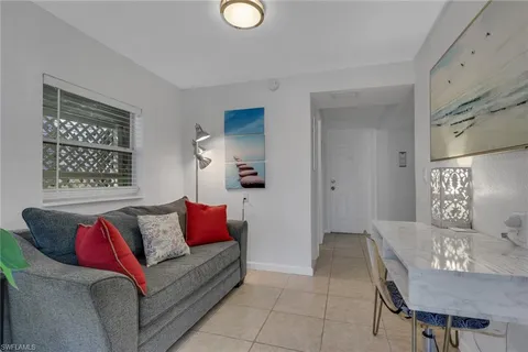 a living room with furniture and a couch