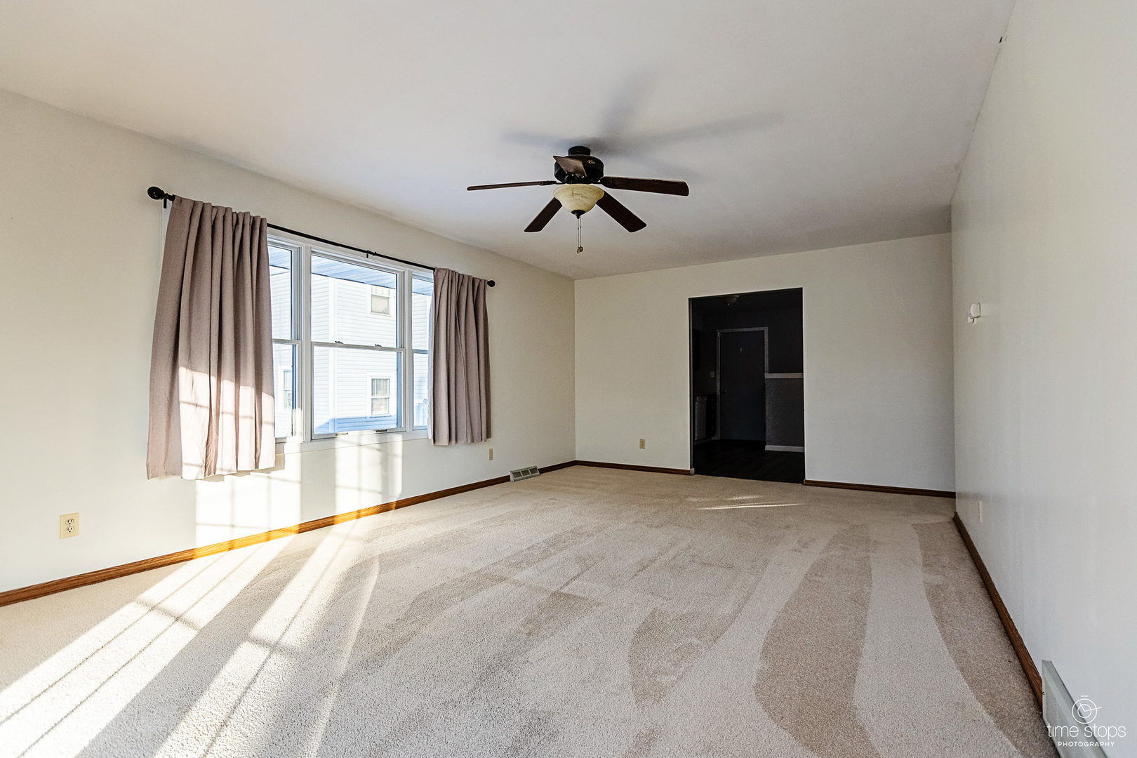 767 Adams Street Ottawa, IL 61350 - Photo 9 of 28 a view of an empty room with a window