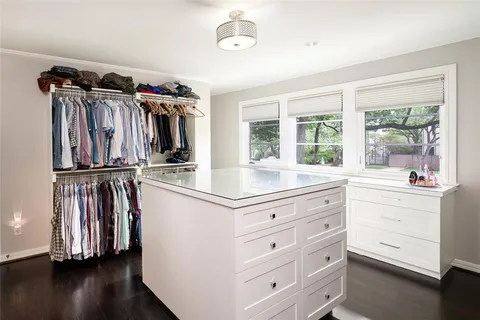 a kitchen with a refrigerator and a sink