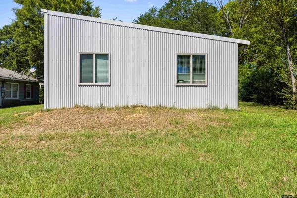 a kitchen with a sink stove and refrigerator
