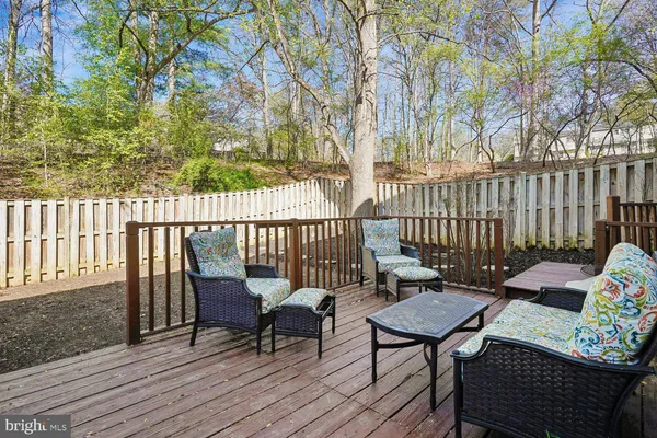 a outdoor living space with furniture and a potted plant