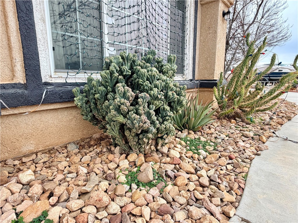 7915 Outpost Road Oak Hills, CA 92344 - Photo 26 of 54 a view of a pathway with a yard