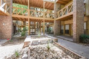 806 West 24th Street, Unit 304 Austin, TX 78705 - Photo 1 of 17 a view of a brick building with a entrance