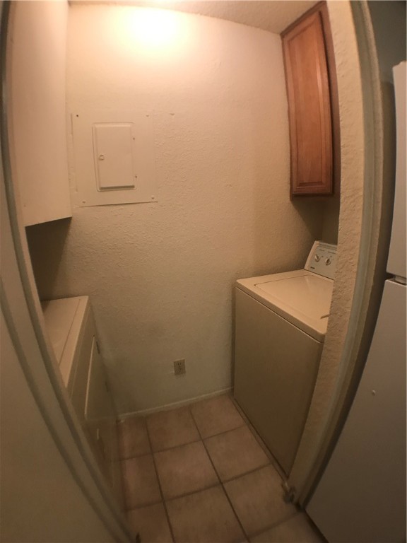 806 West 24th Street, Unit 304 Austin, TX 78705 - Photo 12 of 17 a utility room with dryer and washer