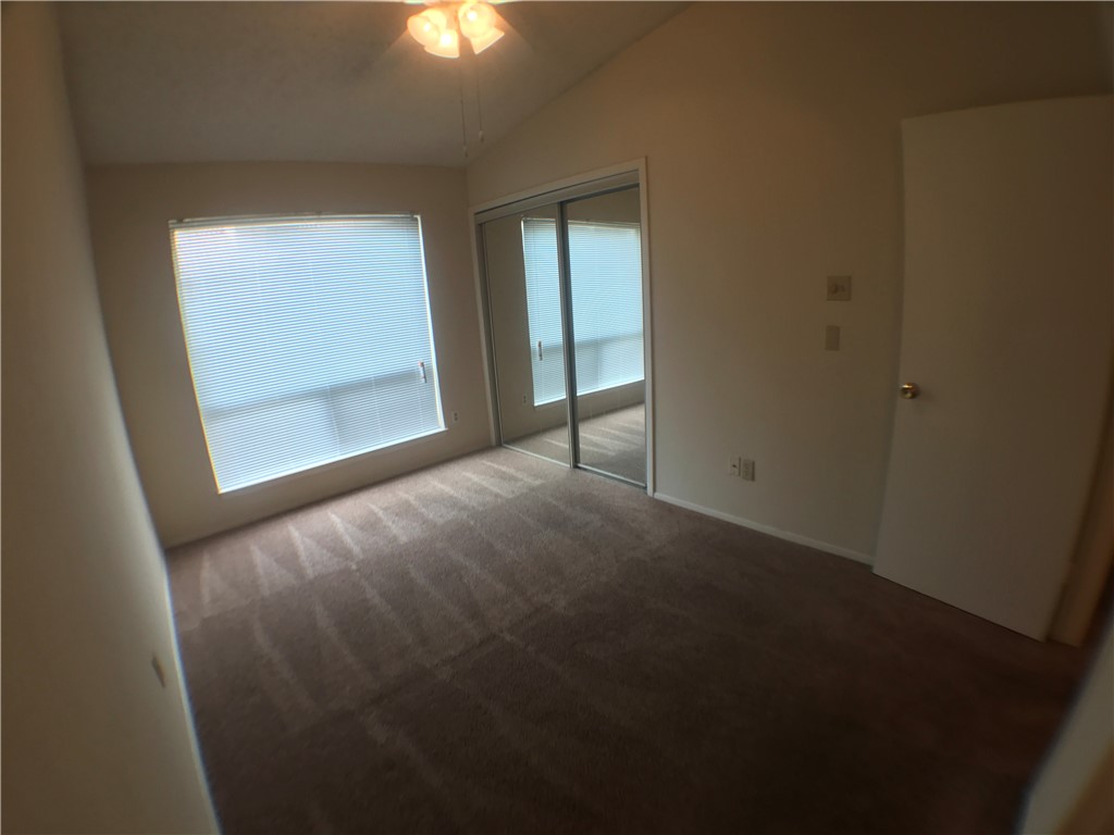 806 West 24th Street, Unit 304 Austin, TX 78705 - Photo 7 of 17 an empty room with windows