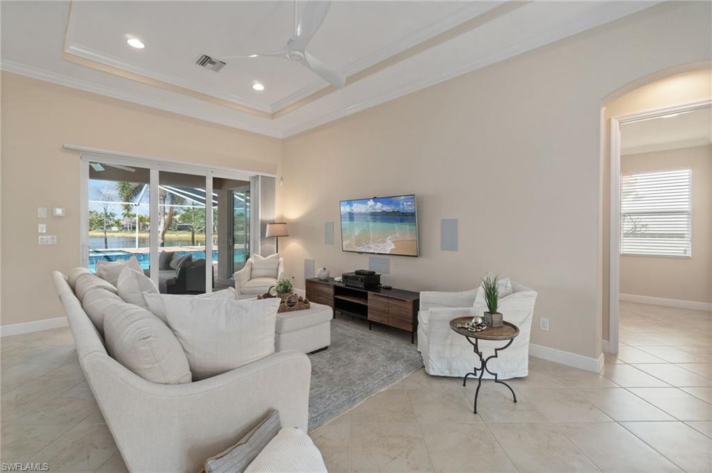 19753 Tesoro Way Estero, FL 33967 - Photo 9 of 47 a living room with furniture and a window