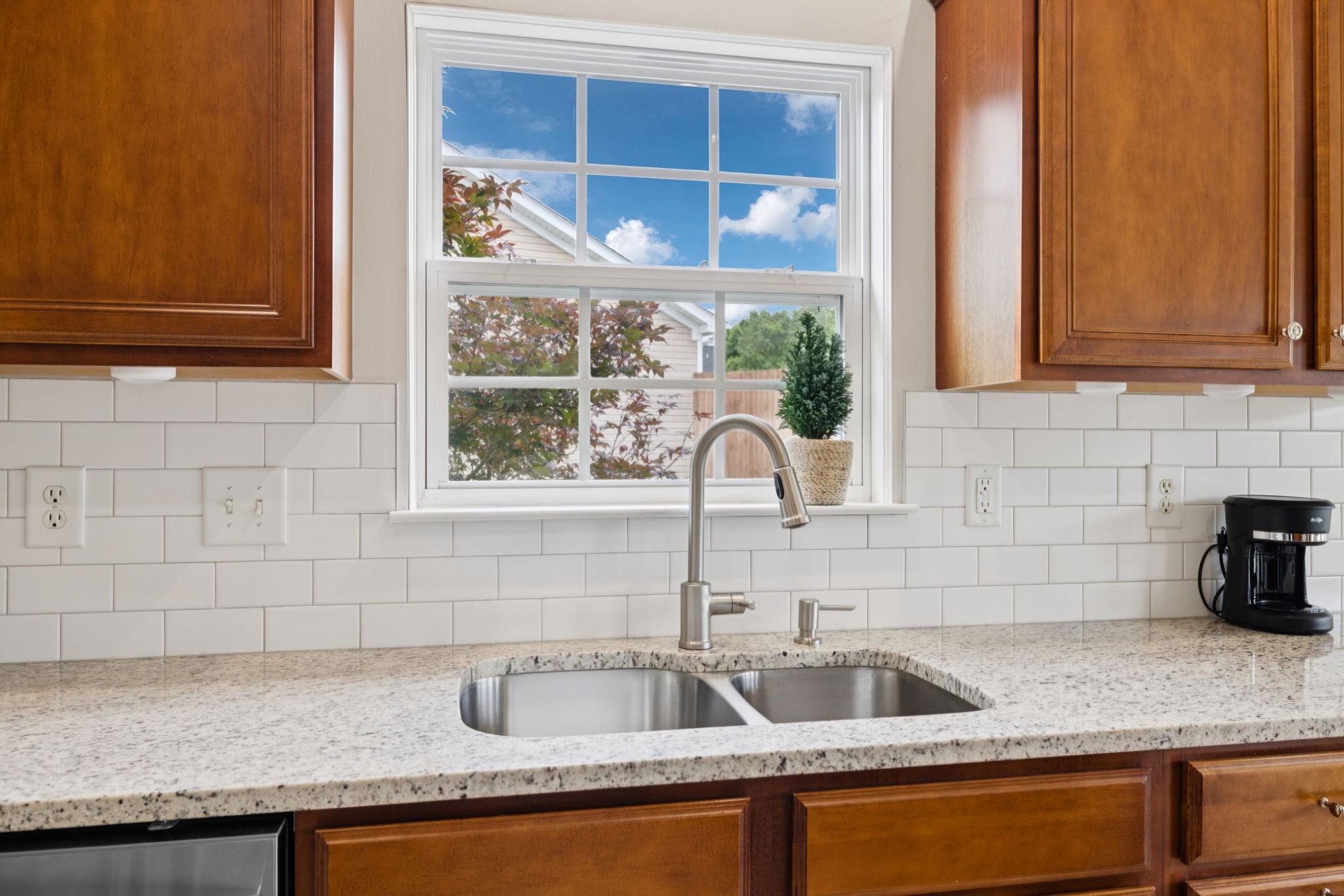 4060 Sequoia Trail Spring Hill, TN 37174 - Photo 11 of 41 a kitchen with granite countertop a sink and a window