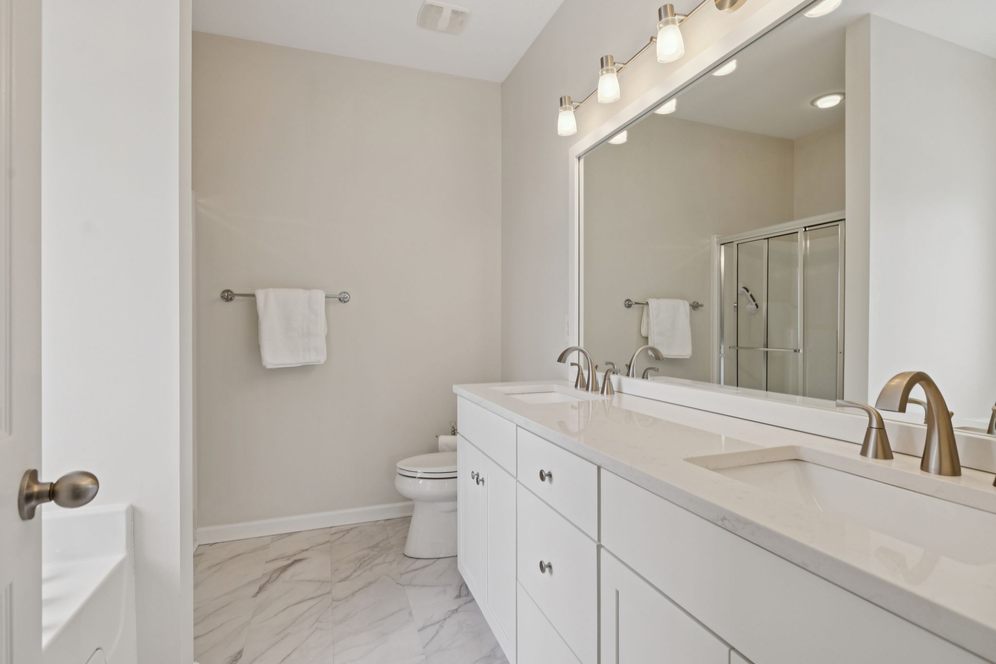 4060 Sequoia Trail Spring Hill, TN 37174 - Photo 19 of 41 a bathroom with a double vanity sink mirror and toilet