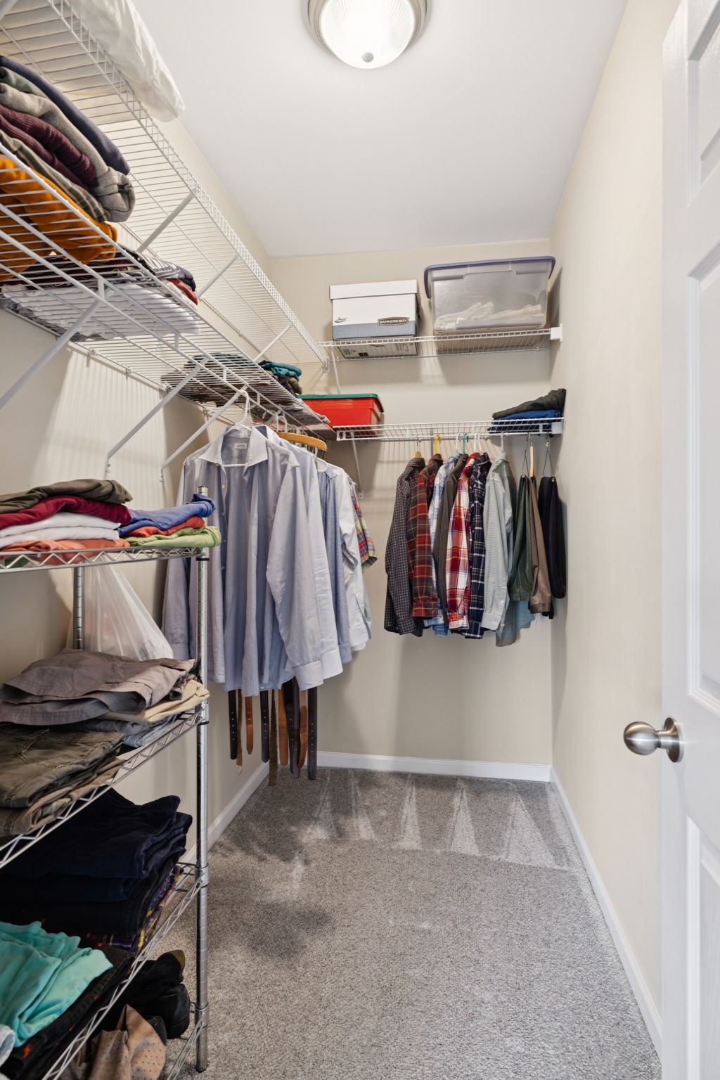 4060 Sequoia Trail Spring Hill, TN 37174 - Photo 23 of 41 a view of walk in closet with clothes and shoes
