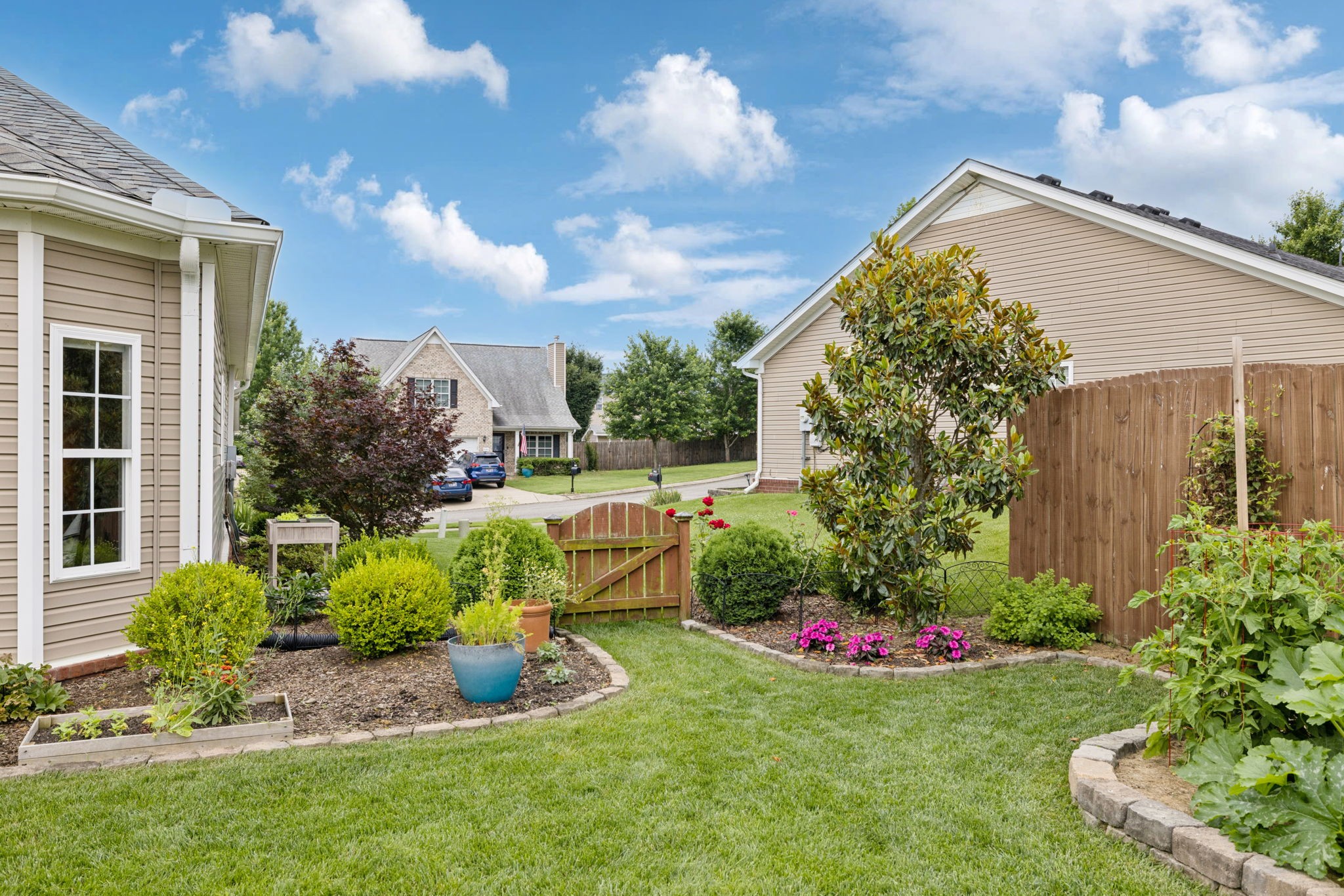 4060 Sequoia Trail Spring Hill, TN 37174 - Photo 30 of 41 a view of a garden with plants and a fountain
