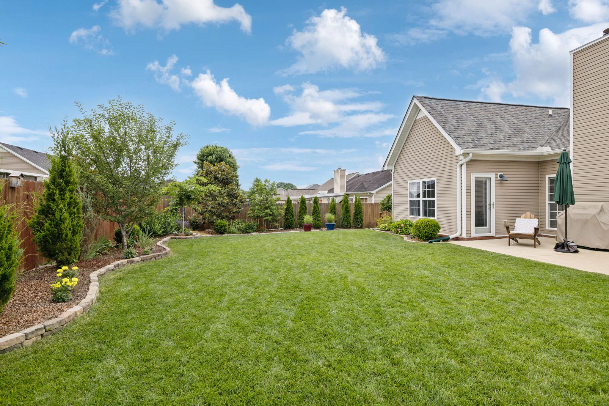 4060 Sequoia Trail Spring Hill, TN 37174 - Photo 3 of 41 a front view of a house with garden
