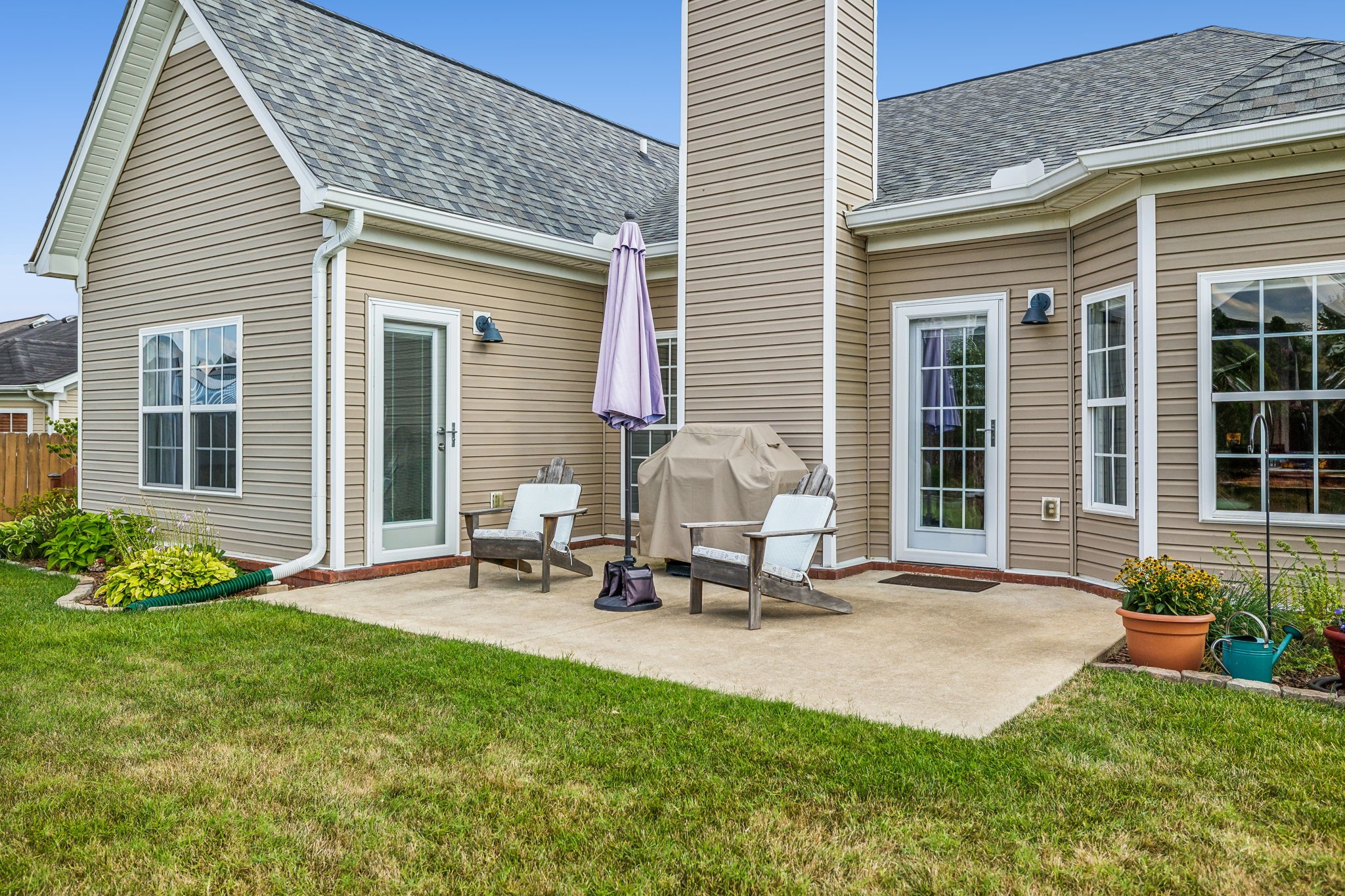 4060 Sequoia Trail Spring Hill, TN 37174 - Photo 32 of 41 a view of a house with backyard sitting area and garden