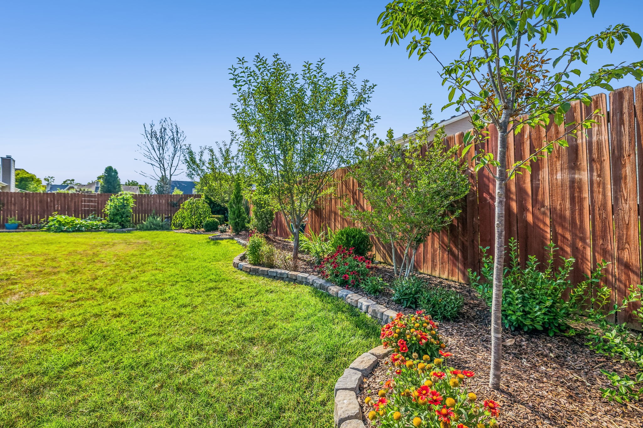4060 Sequoia Trail Spring Hill, TN 37174 - Photo 34 of 41 a view of a garden with a building in the background