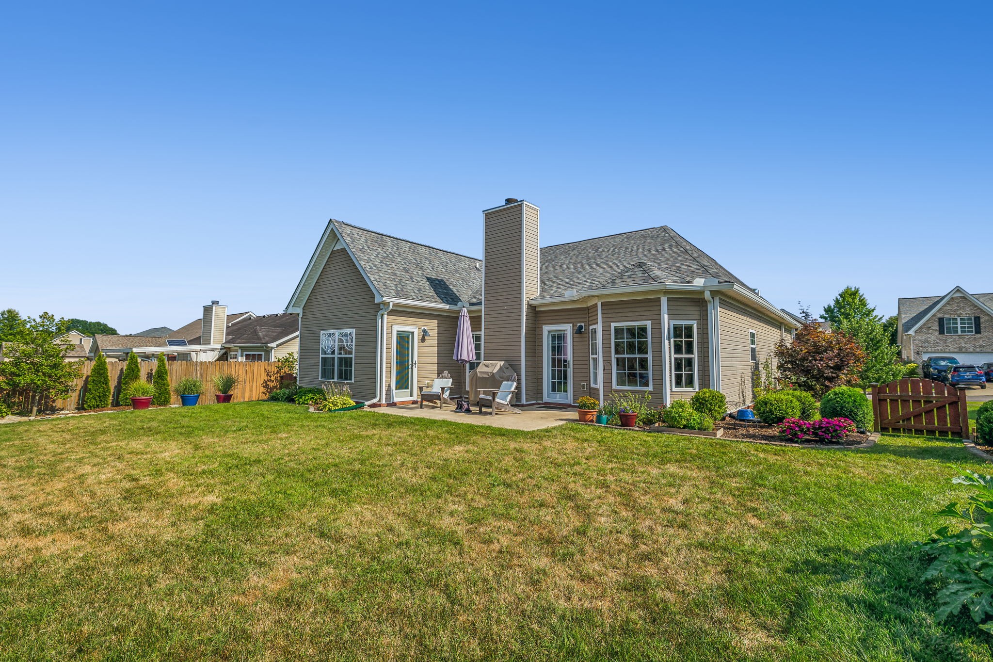 4060 Sequoia Trail Spring Hill, TN 37174 - Photo 35 of 41 a front view of a house with a yard table and chairs