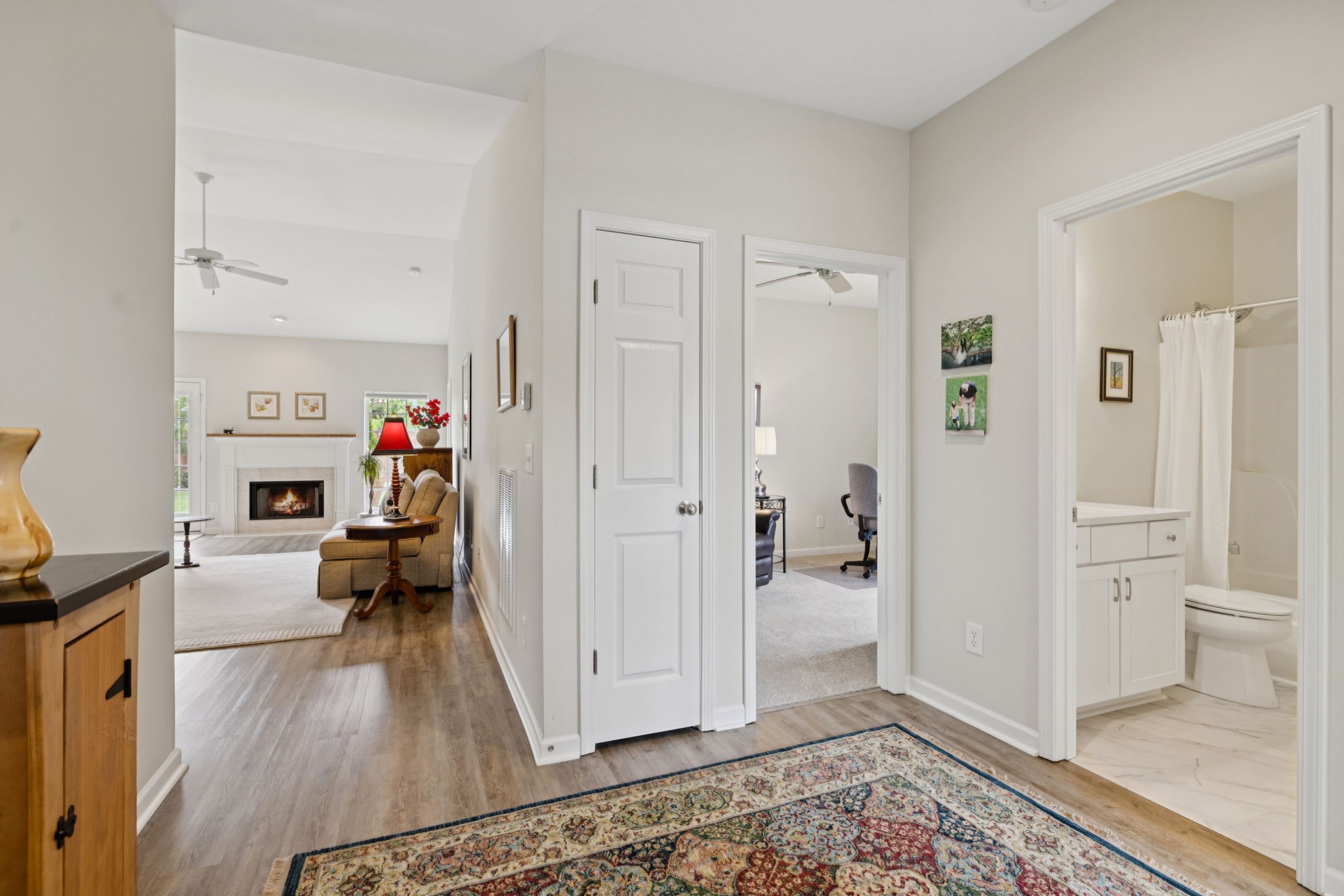 4060 Sequoia Trail Spring Hill, TN 37174 - Photo 5 of 41 a view of a livingroom with wooden floor and a couch