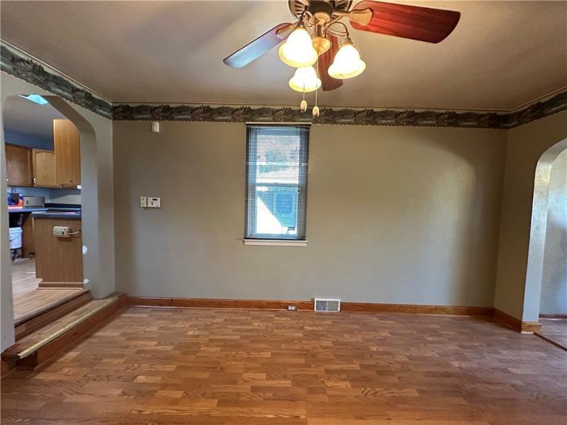 1447 Fleming Avenue McKees Rocks, PA 15136 - Photo 12 of 37 a view of an empty room with a chandelier