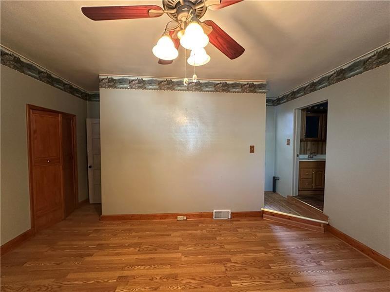 1447 Fleming Avenue McKees Rocks, PA 15136 - Photo 17 of 37 a view of a room with wooden floor