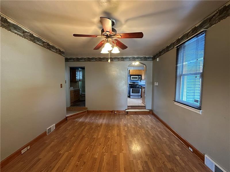 1447 Fleming Avenue McKees Rocks, PA 15136 - Photo 18 of 37 wooden floor in an empty room with a window
