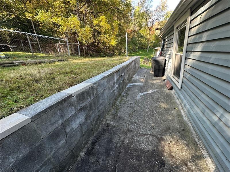 1447 Fleming Avenue McKees Rocks, PA 15136 - Photo 6 of 37 a view of outdoor space with deck and yard