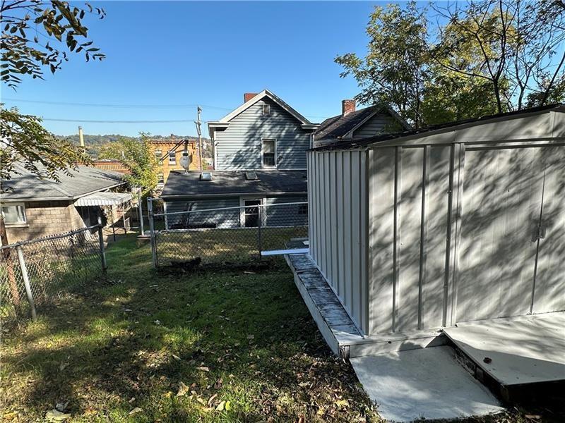 1447 Fleming Avenue McKees Rocks, PA 15136 - Photo 9 of 37 a view of a house with a yard